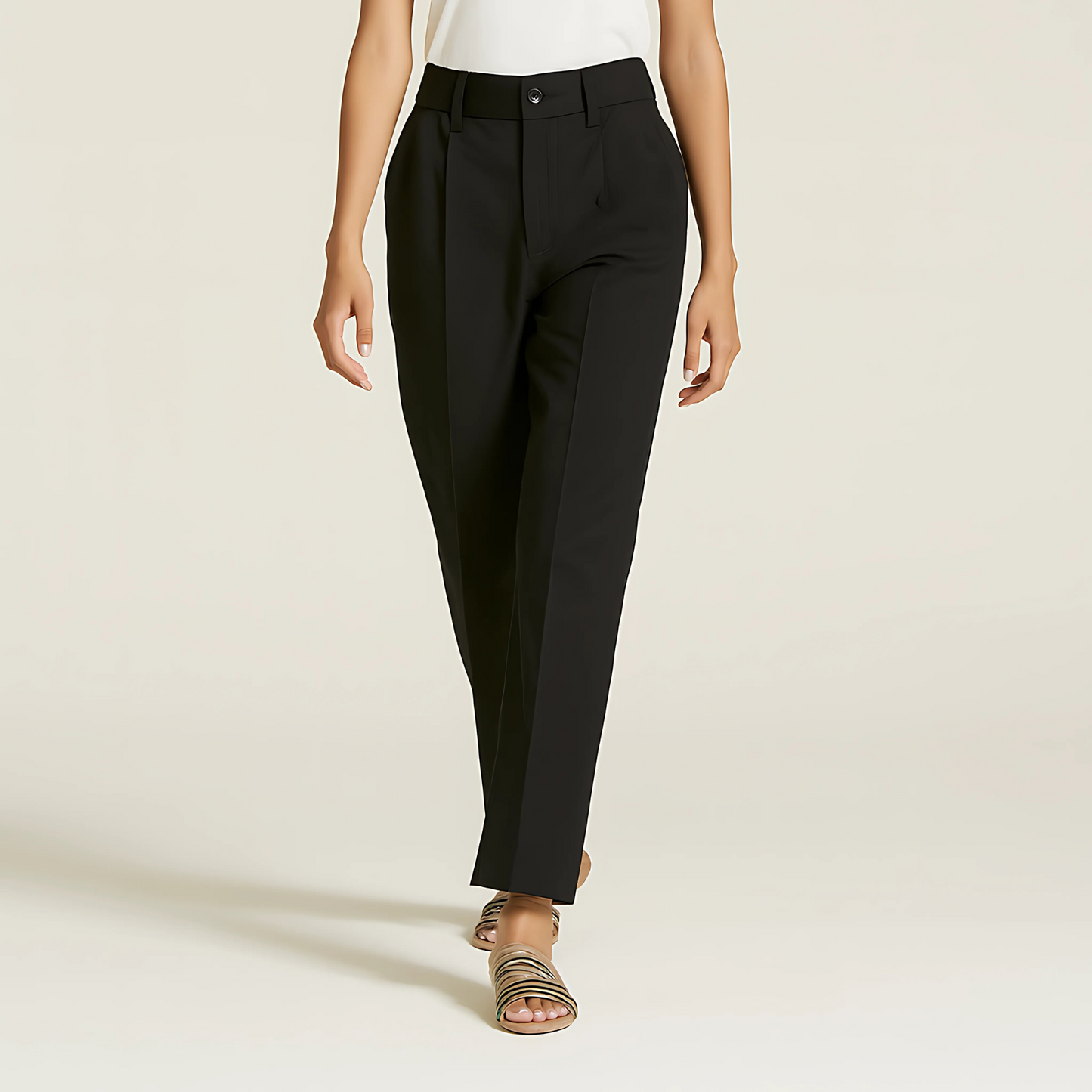The Amalfi Tailored Trouser in Jet Black with pleats and tapered silhouette for sophisticated styling.