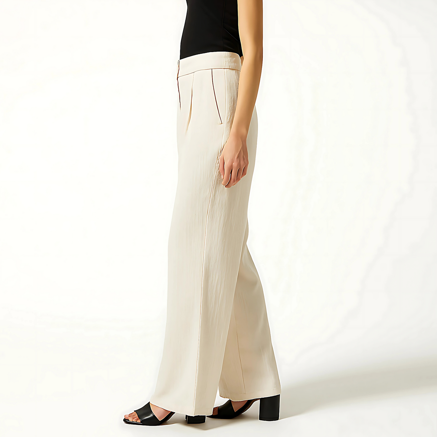 Ivory Linen Blend Cadence Wide-Leg Trouser with clean waistband and front pleats, shown with black top and heels.