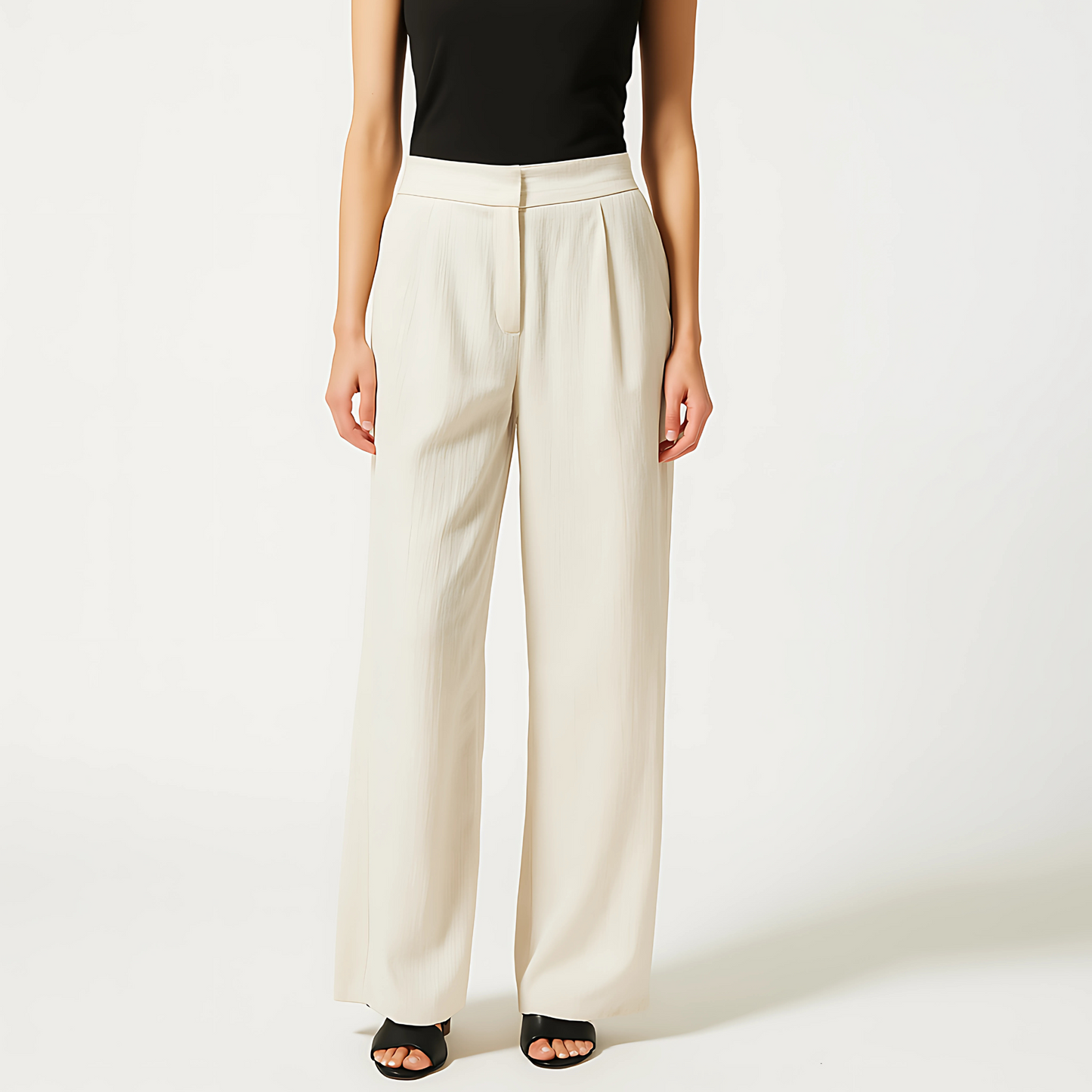 Ivory Linen-Blend Cadence Wide-Leg Trousers with clean waistband and side pockets, ideal for resort wear and loungewear.