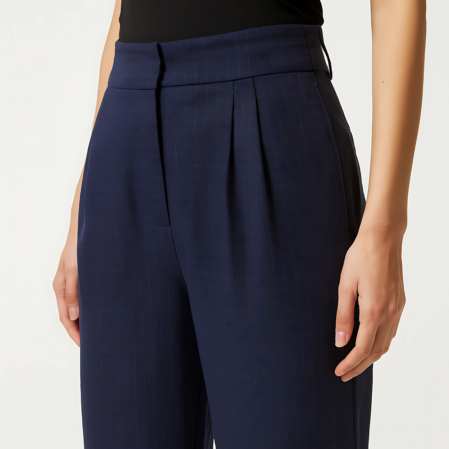 The Cadence Wide-Leg Trouser in Midnight Navy, featuring front pleats, clean waistband, and minimalist side pockets.