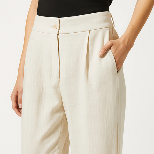 Ivory Cadence wide-leg trouser with clean waistband and side pockets, in elegant linen-viscose blend for resort or loungewear.