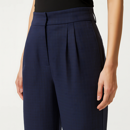 The Cadence Wide-Leg Trouser in Midnight Navy, featuring front pleats, clean waistband, and minimalist side pockets.