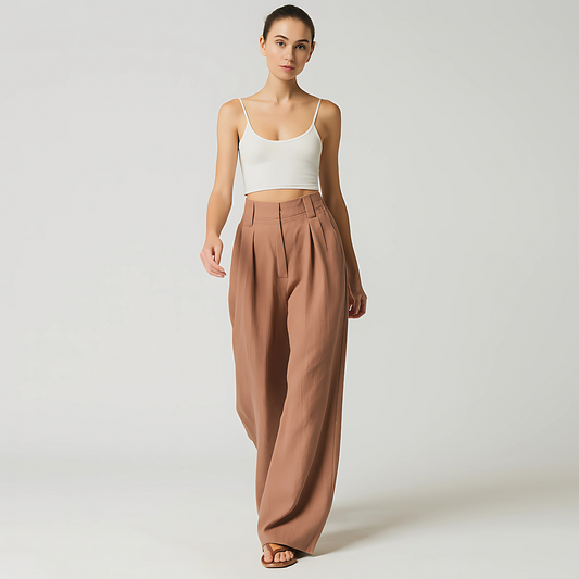 Woman wearing Solana Linen Trouser in Terracotta, featuring a wide-leg and high-waist design for elegant resort and travel fashion.